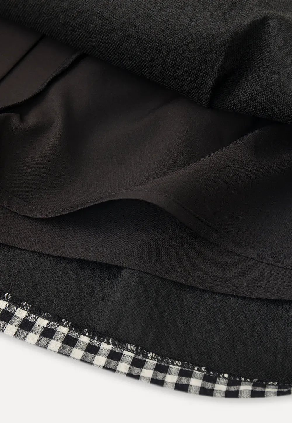 Plaid skirt with pleats and ruffled top