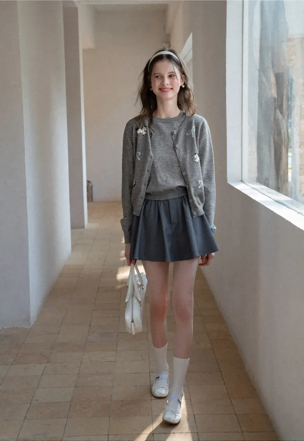 Woolen knit sweater with horse and bow motifs