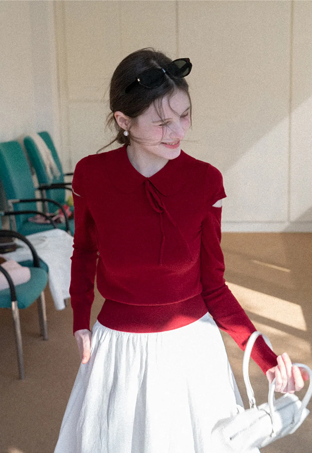 Elegant Knit Sweater with Bow Detail and Cutout Sleeves