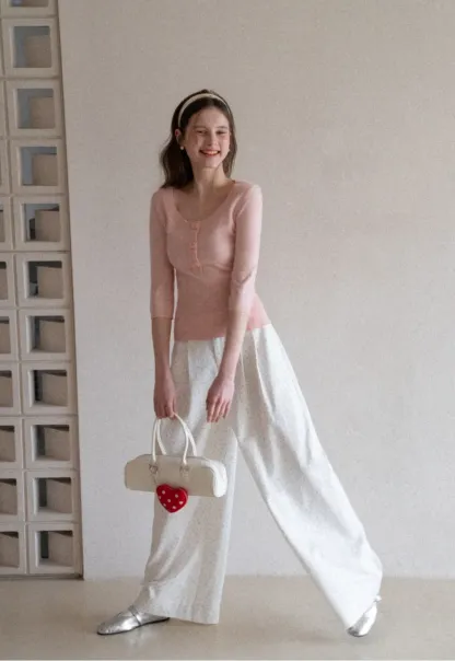 Woolen knit sweater with ribbed hem and cuffs