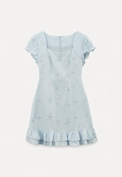 Eyelet dress with puff sleeves and ruffled hem