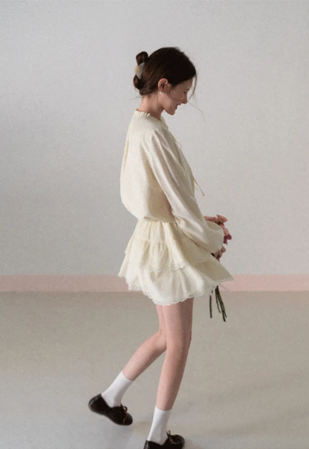 Shirt with ruffled collar and tie front layered skirt