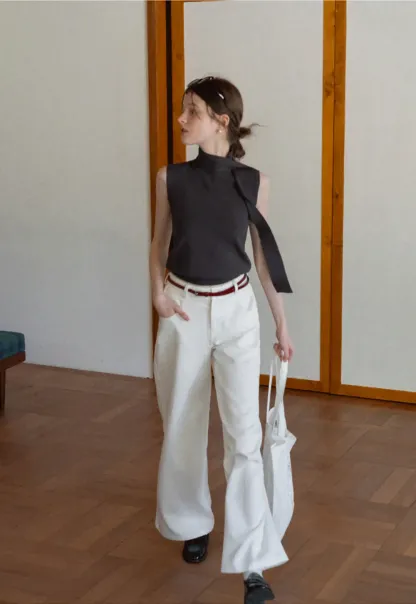 Sleeveless high neck knit top with side tie detail