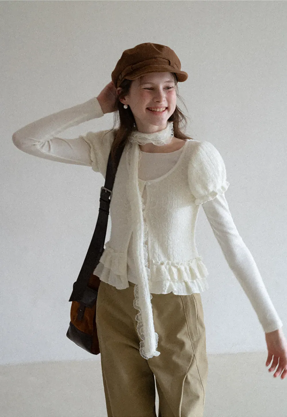 floral lace top with puffed sleeves and ruffled hem