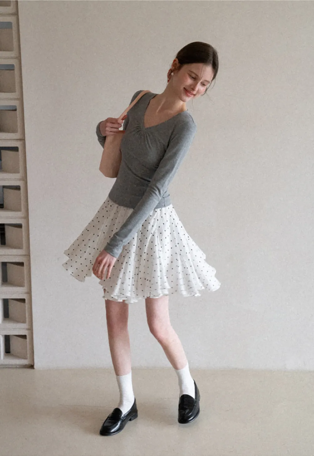 Polka dot pleated skirt with elastic waistband