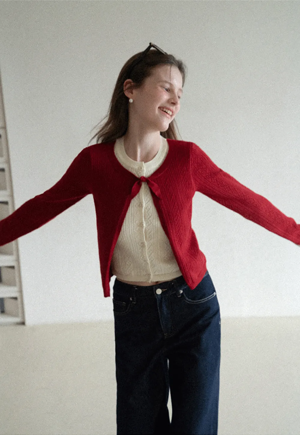 Elegant Knit Cardigan with Bow Detail and Ribbed Texture