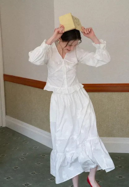 Shirt with ruffled sleeves and layered skirt