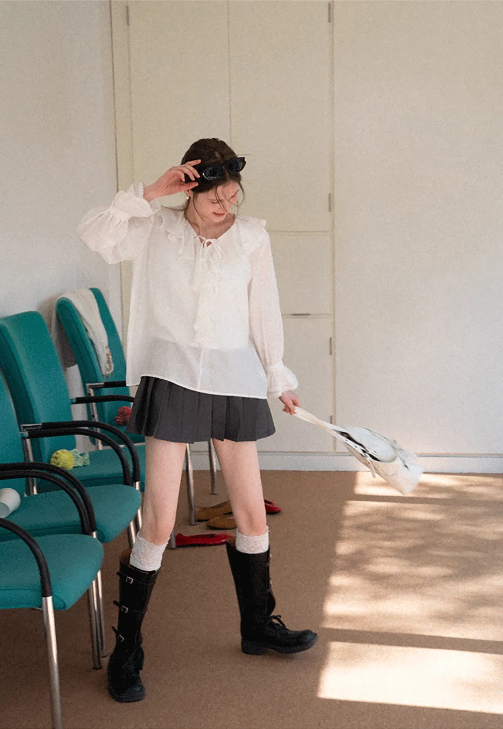 Elegant Blouse with Ruffled Neckline and Flared Sleeves