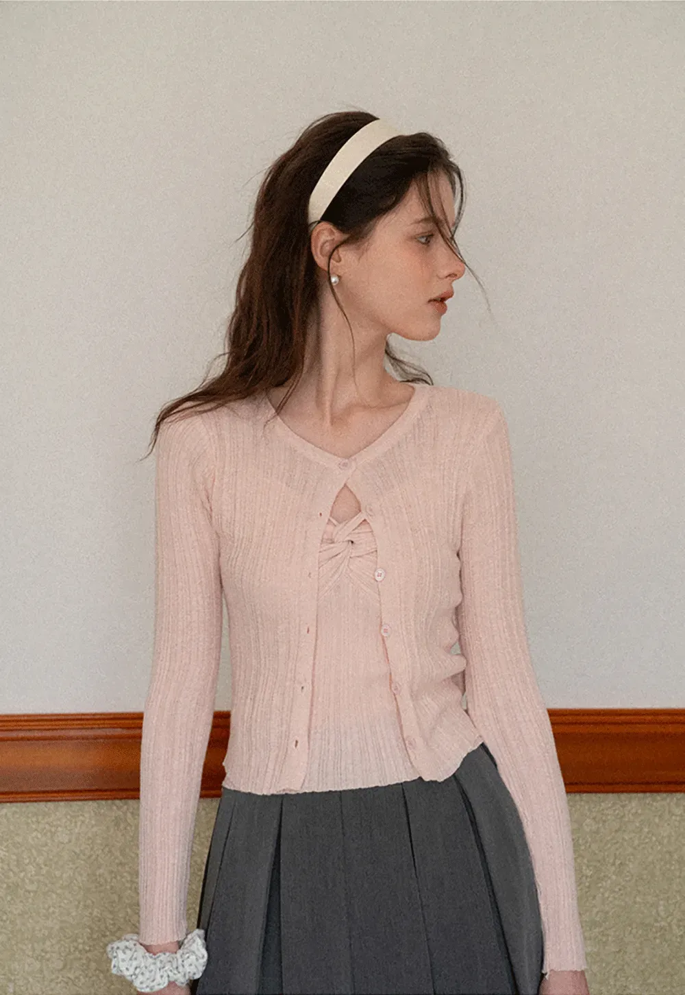 Ribbed knit sweater with V neckline and long sleeves