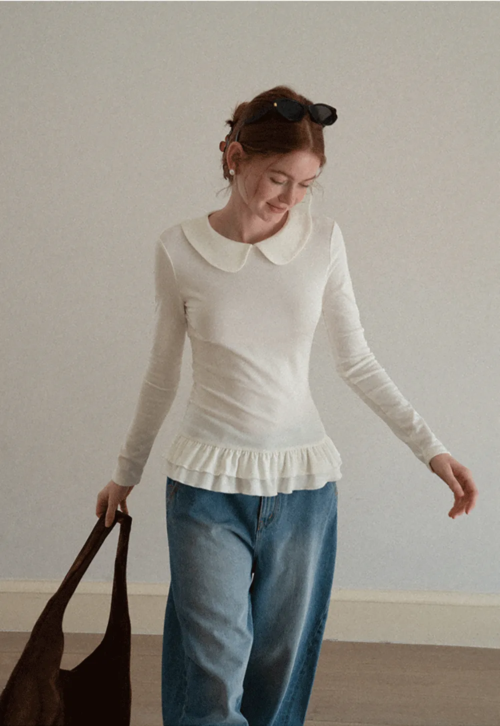 Elegant Long Sleeve Top with Ruffled Hem and Collar Design