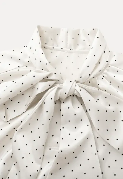 Elegant blouse with bow collar and long sleeves