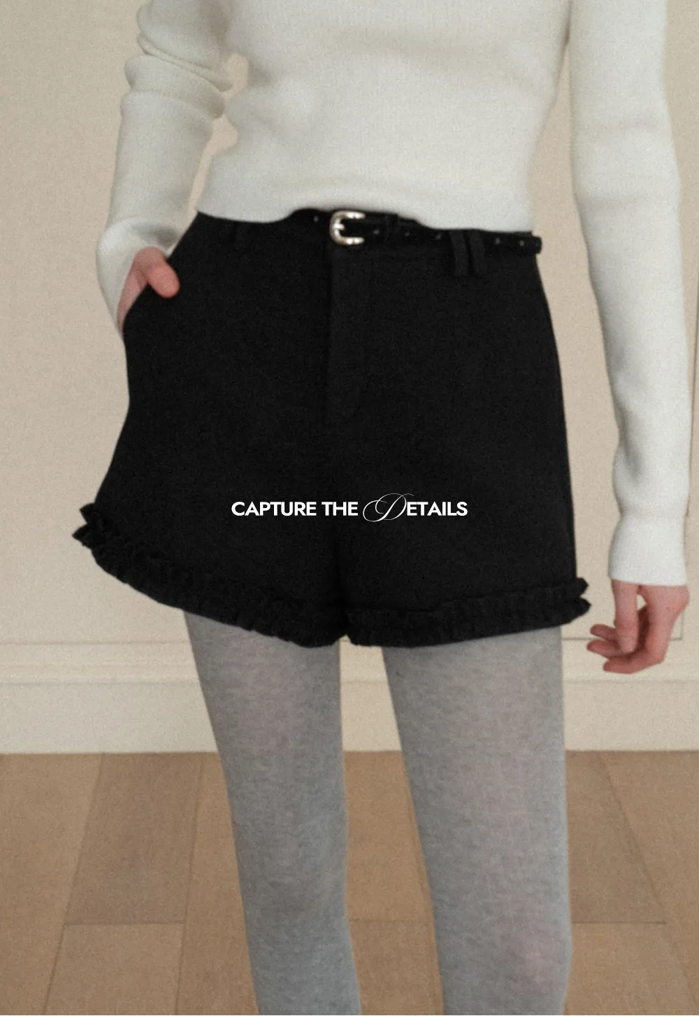 High waist shorts with ruffle hem and belt design