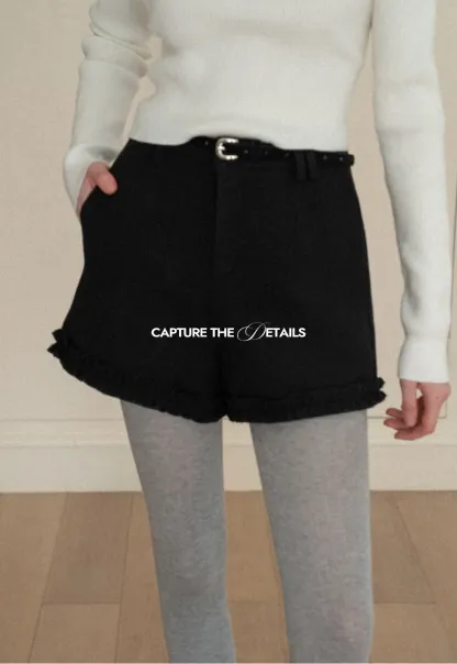 High waist shorts with ruffle hem and belt design