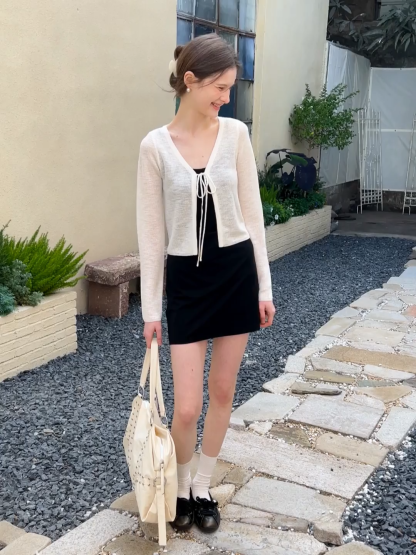 Sleeveless fitted mini dress with thin straps