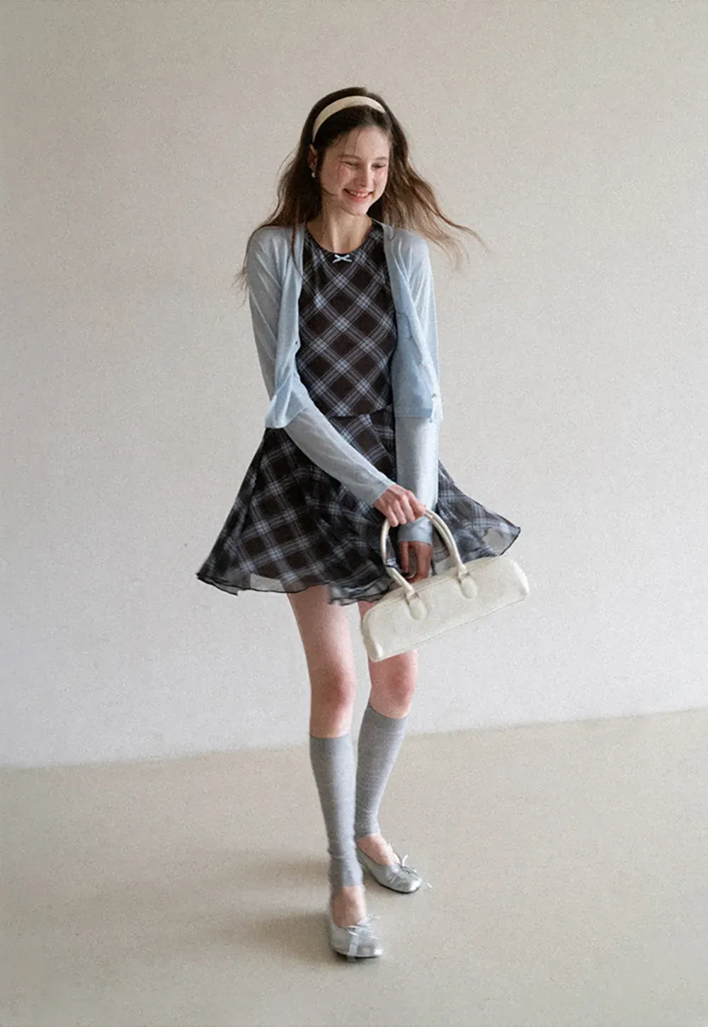 Plaid sleeveless dress with flared skirt