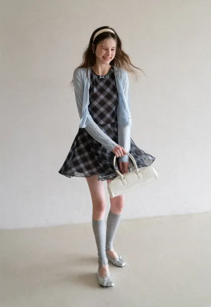 Plaid sleeveless dress with flared skirt