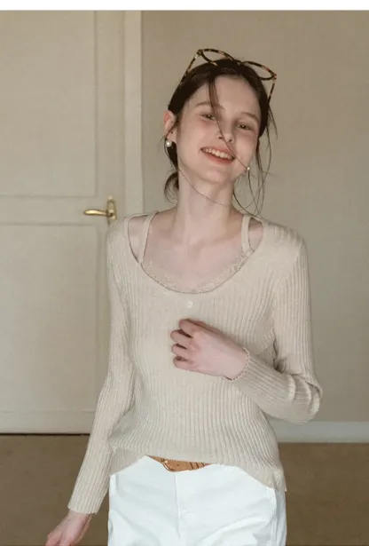 Ribbed knit sweater with boat neck and long sleeves