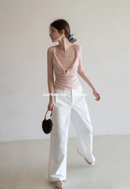 Silk-like tank top with thin straps and draped neckline