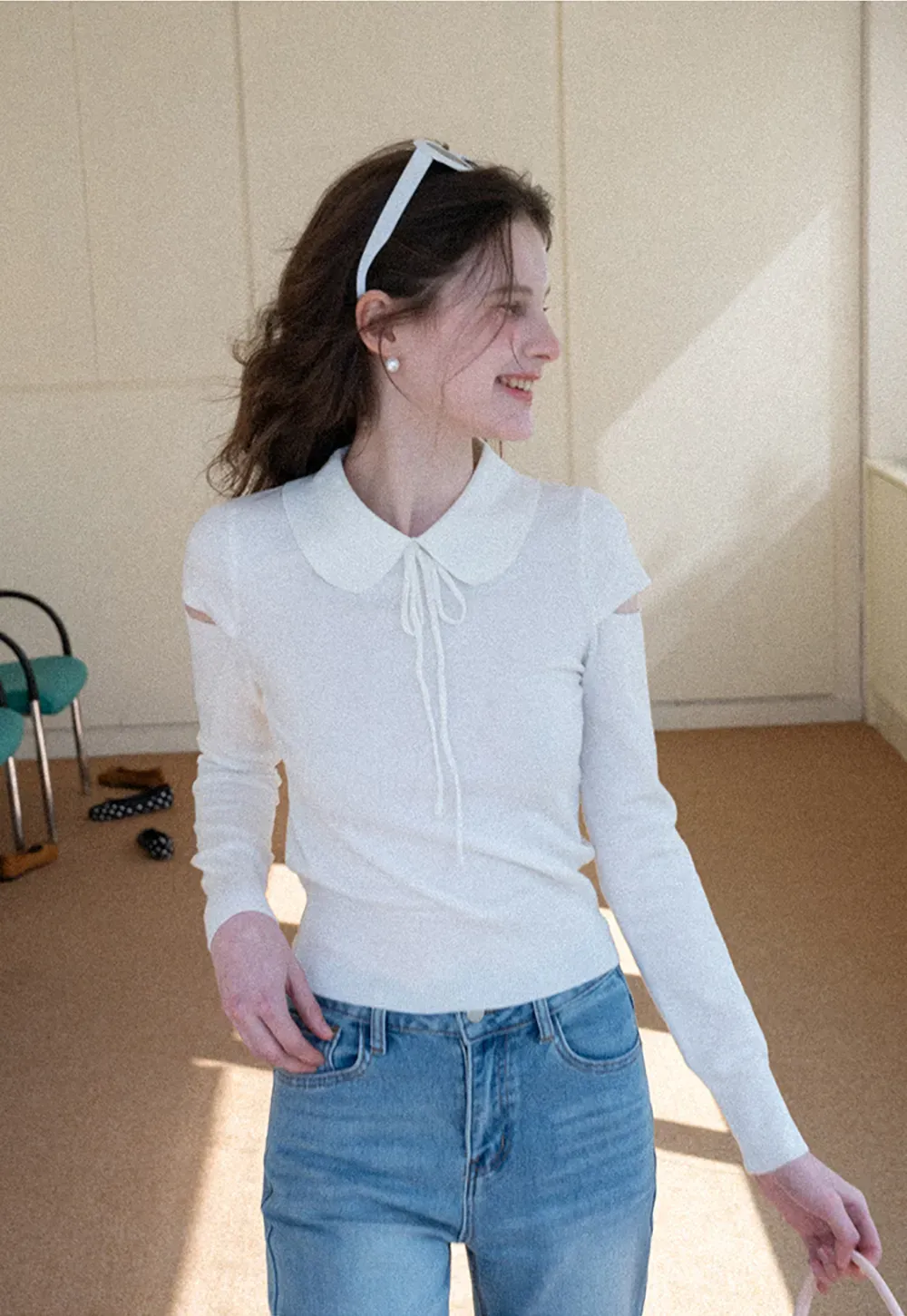 Elegant Knit Sweater with Bow Detail and Cutout Sleeves