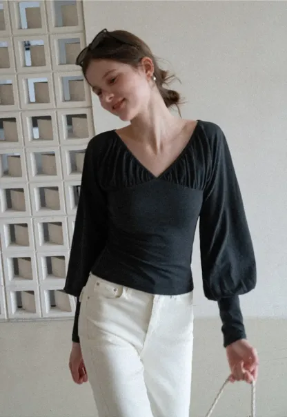 V neck long sleeve top with ruched detail