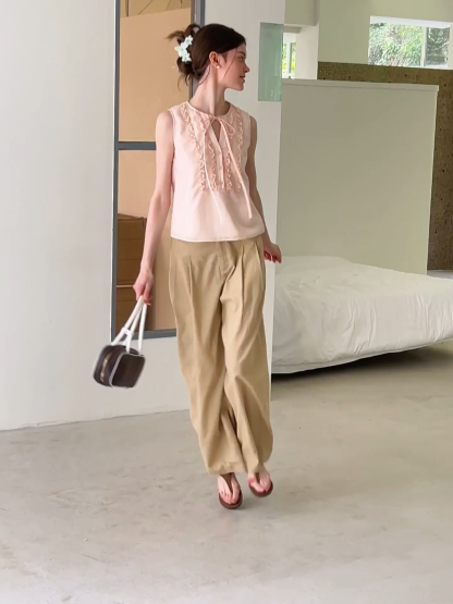 Ruffled Trim Sleeveless Shirt With Tie Neck Detail