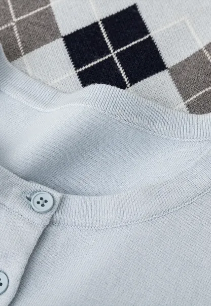 Woolen knit sweater with argyle pattern and buttons