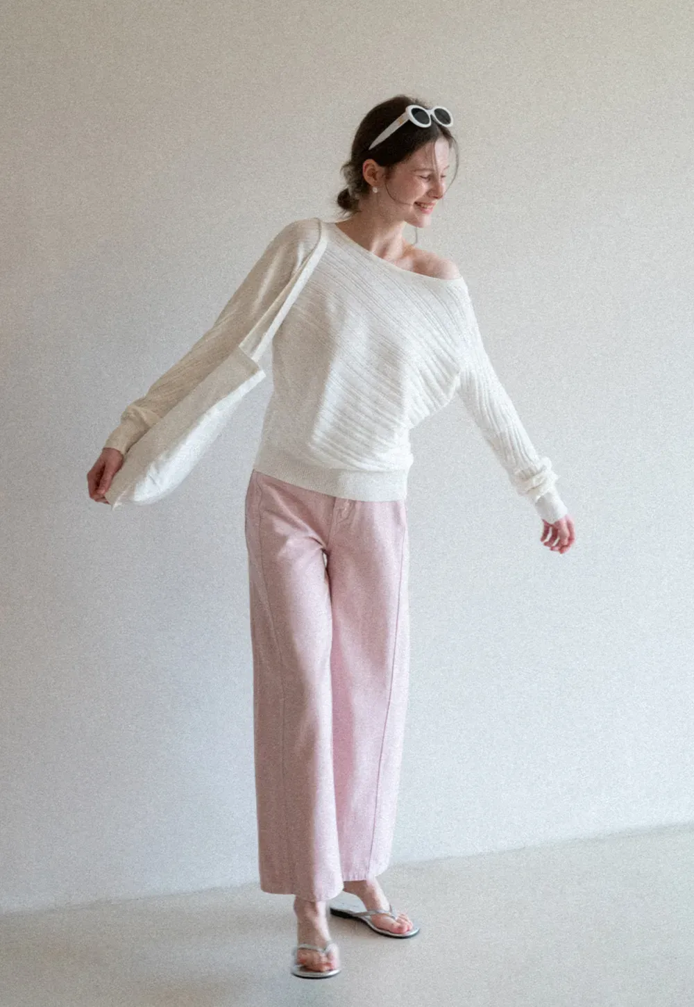 Ribbed knit sweater with wide neckline and long sleeves