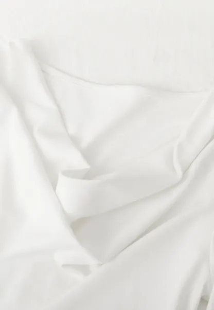 Elegant asymmetrical long sleeve dress with unique belt design