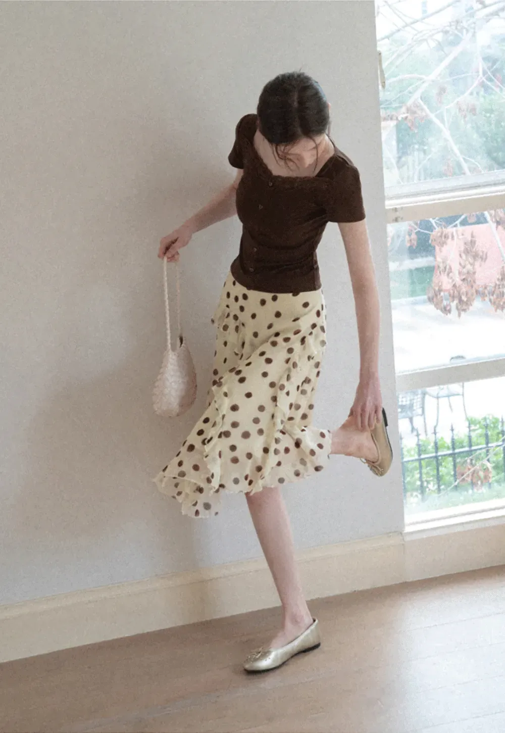 Polka dot ruffled asymmetrical midi skirt