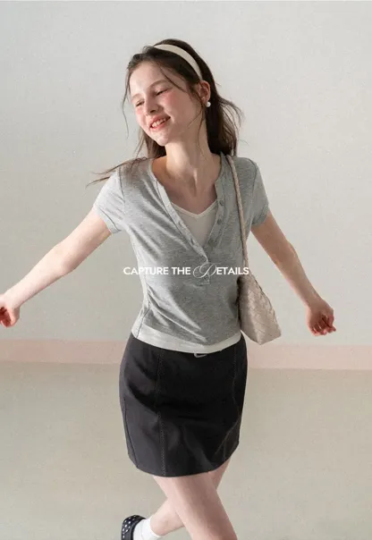 A-line mini skirt with contrast stitching and belt