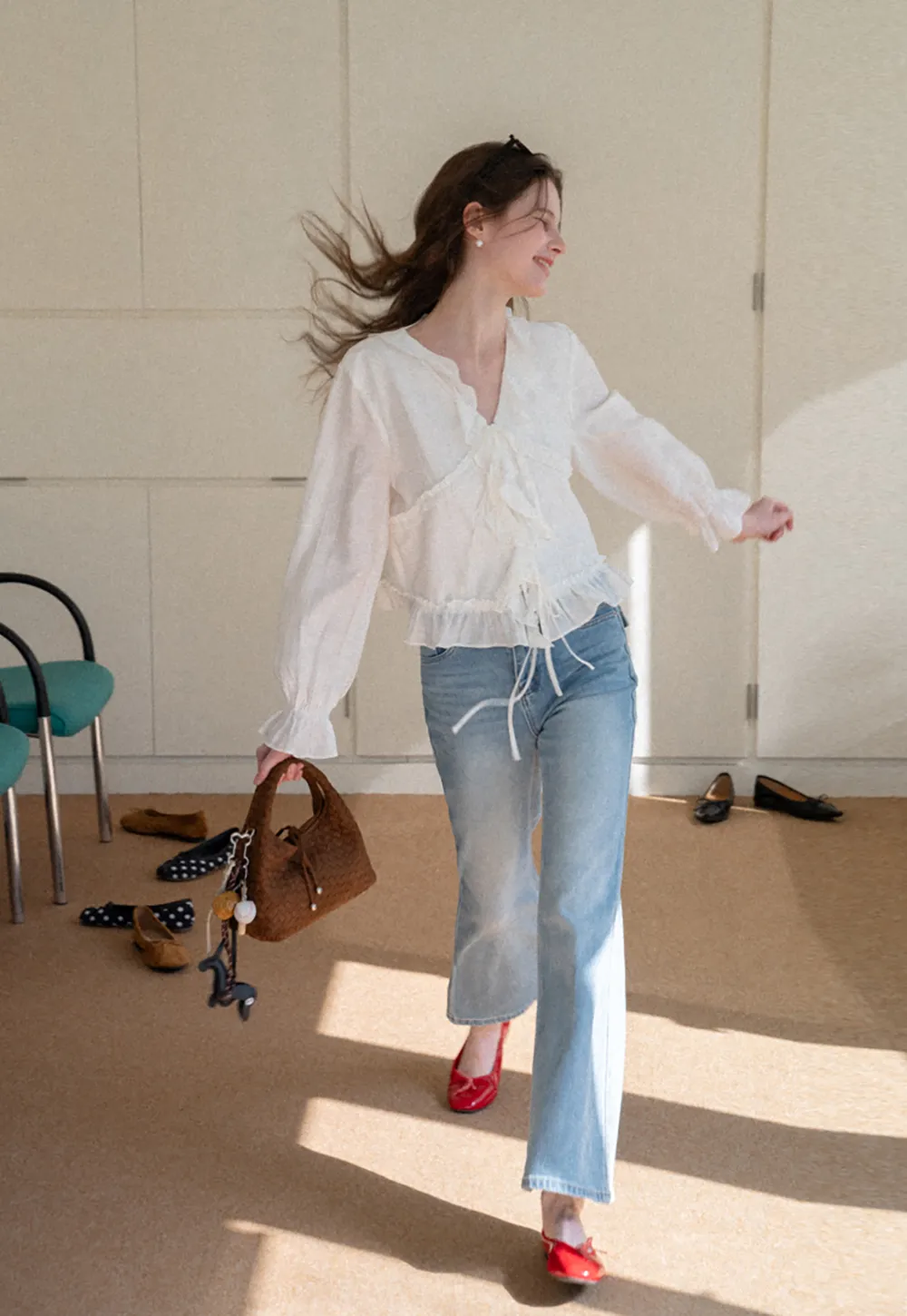 Elegant Blouse with Ruffle Detail and Tie Front Design