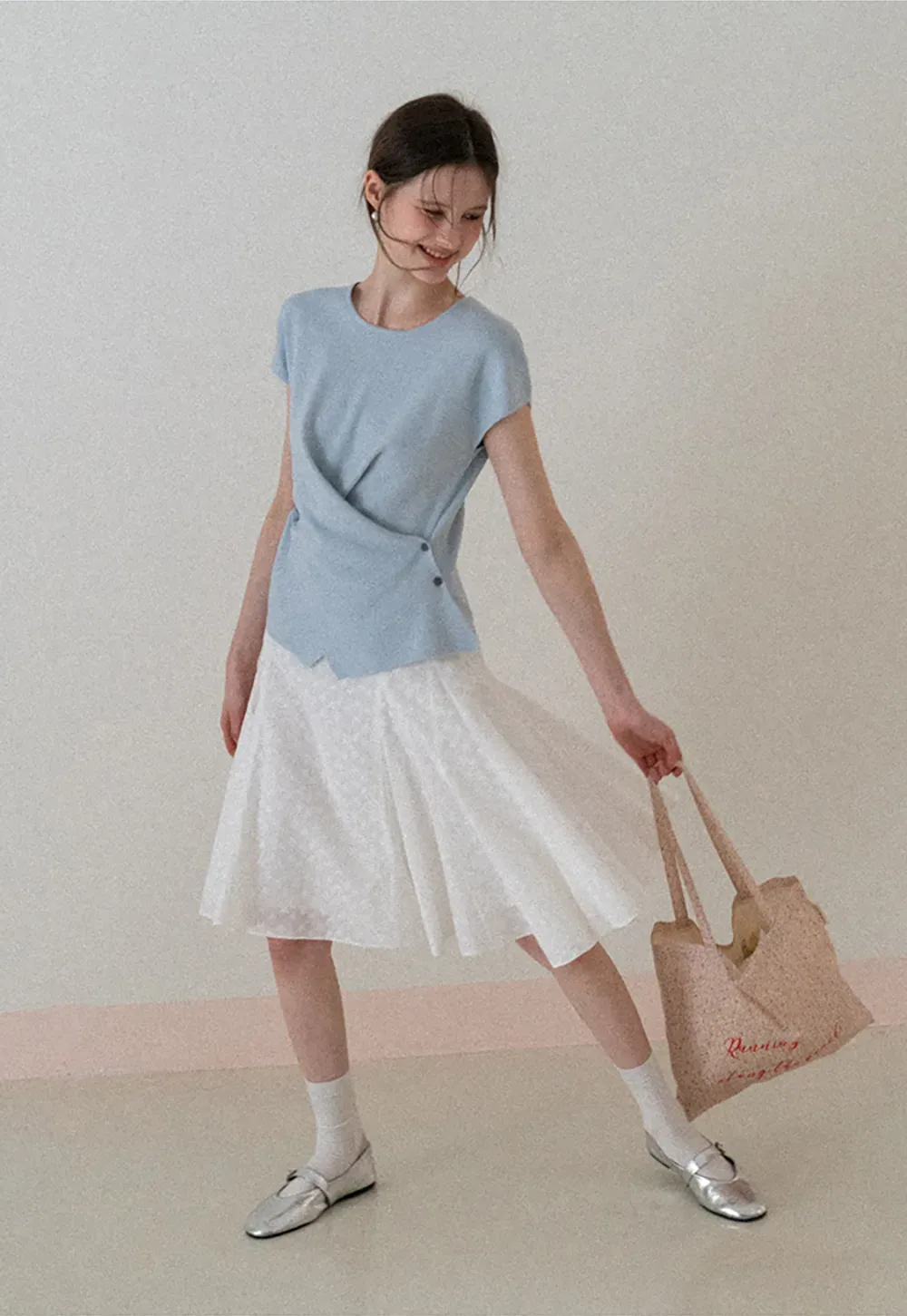 Flared pleated skirt with subtle texture