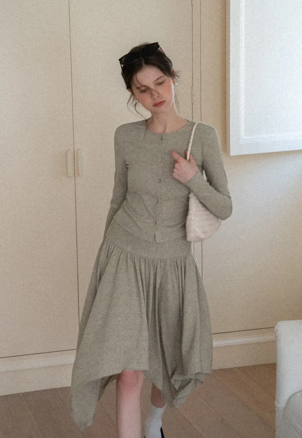 Long sleeve button front top and asymmetrical skirt