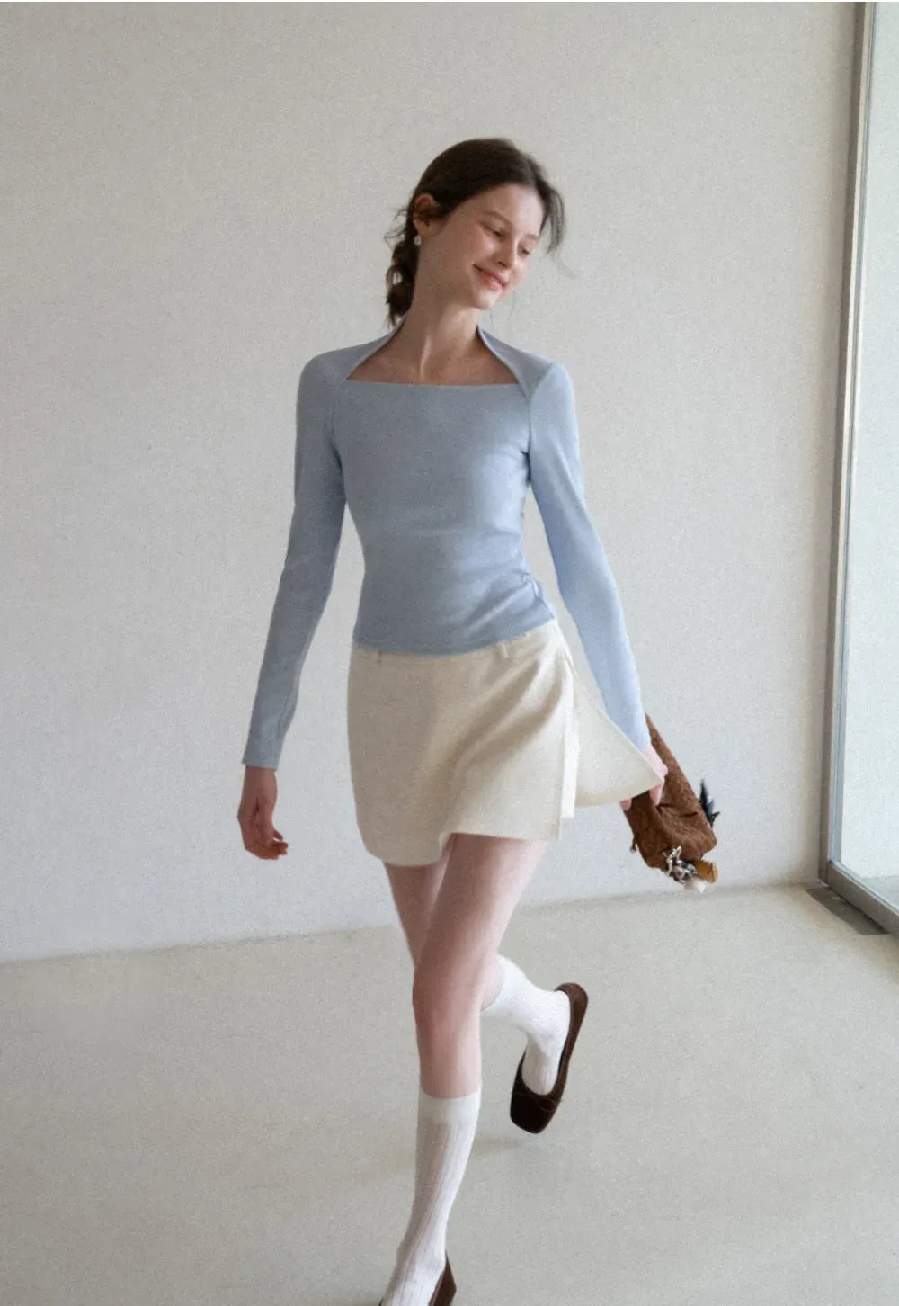 Elegant Pleated Mini Skirt with Asymmetrical Hem