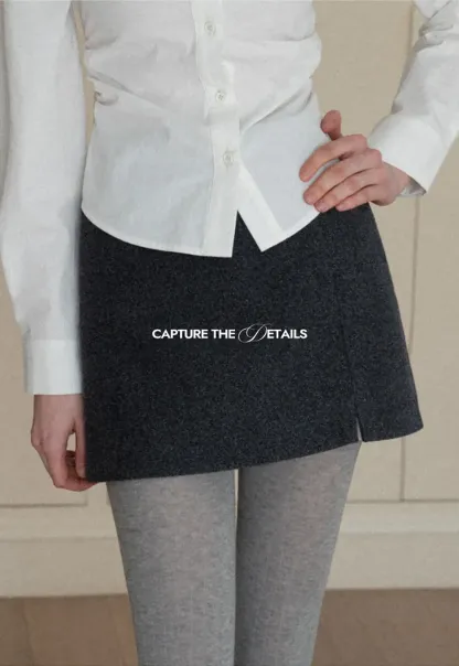 A-line mini skirt with textured fabric and central seam design