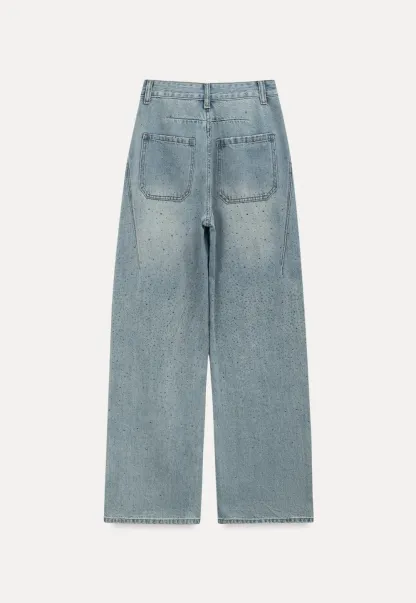 Wide leg jeans with subtle dot embellishments