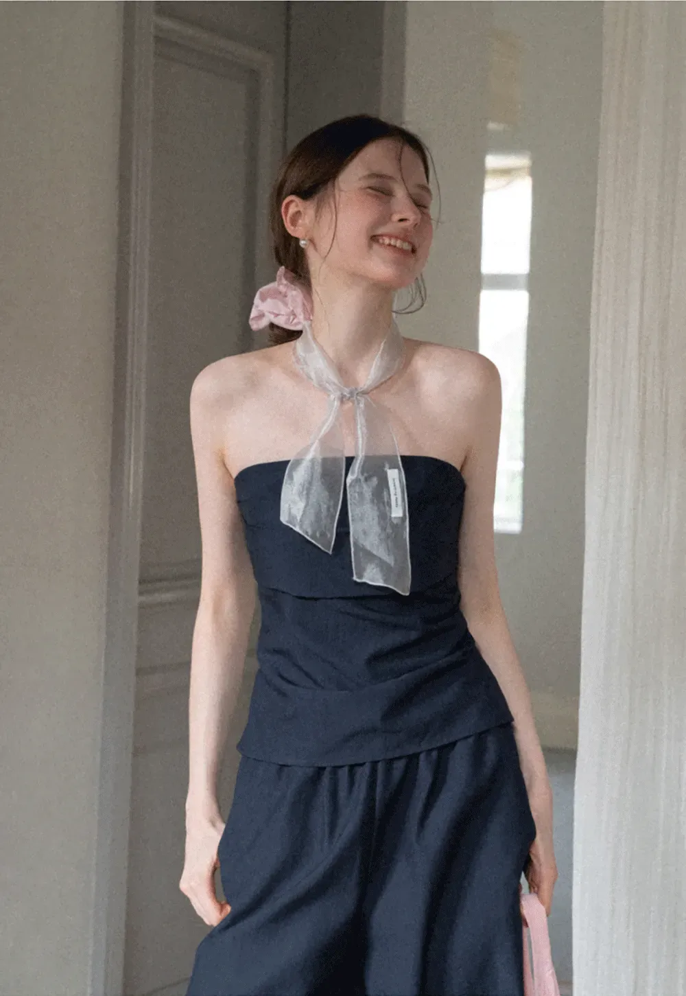 Strapless top with sheer neck tie and loose fit pants