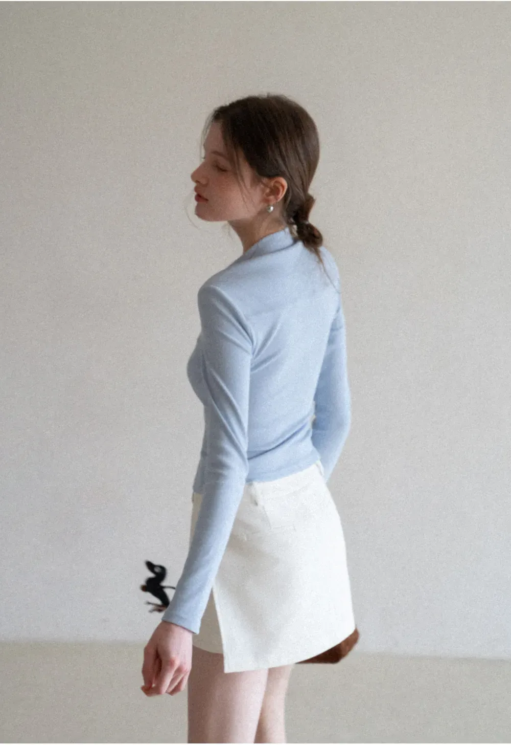 Elegant Pleated Mini Skirt with Asymmetrical Hem