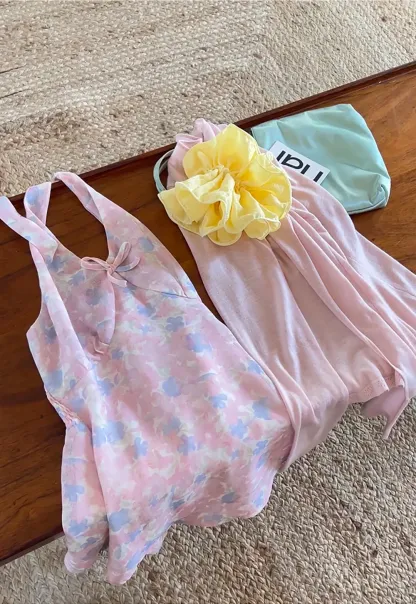 Woolen knit sweater with tie front and floral tank top