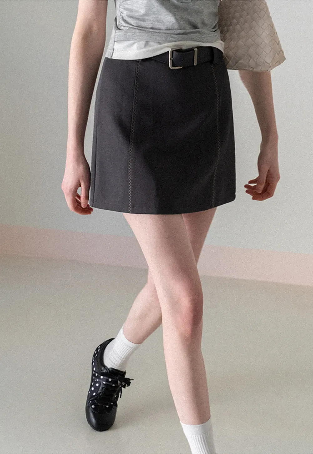 A-line mini skirt with contrast stitching and belt