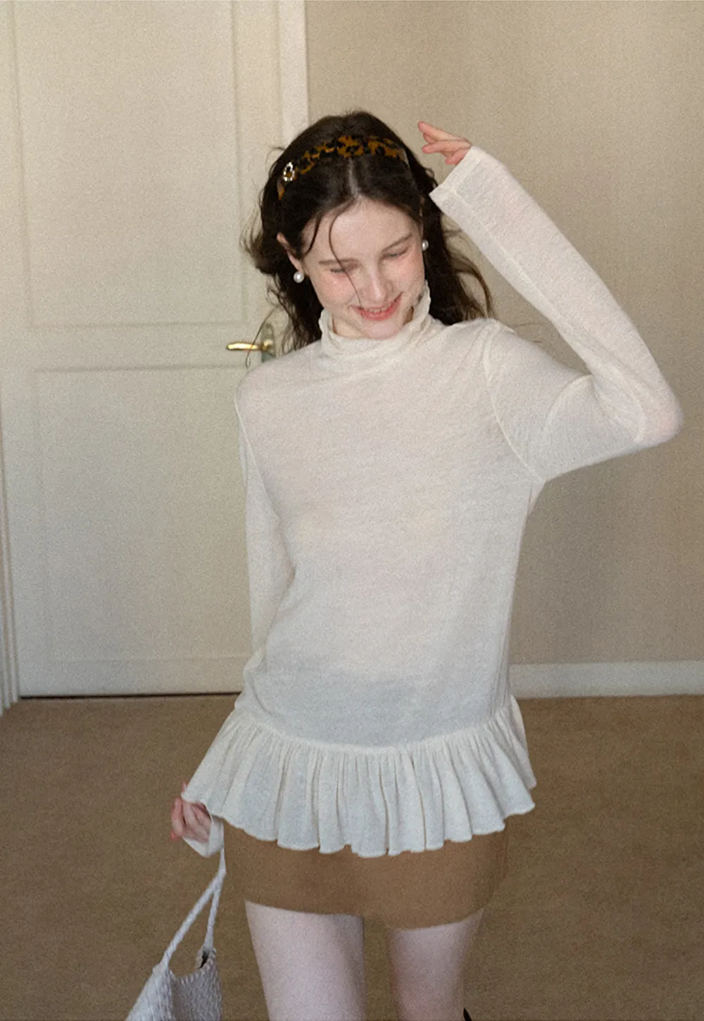 High waist pleated mini skirt with button front design