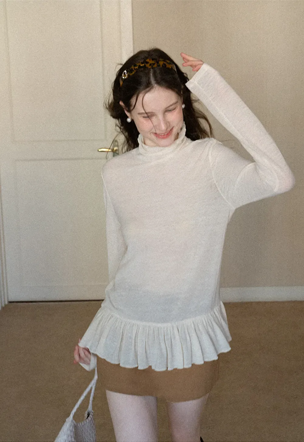 High waist pleated mini skirt with button front design