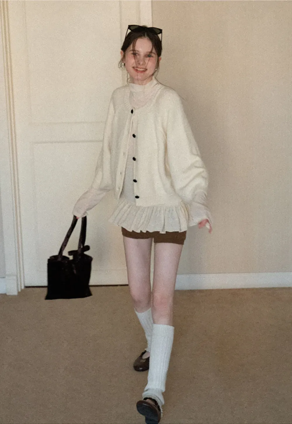 Soft knit cardigan with button front and relaxed fit