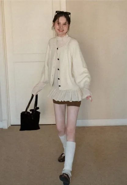 Soft knit cardigan with button front and relaxed fit