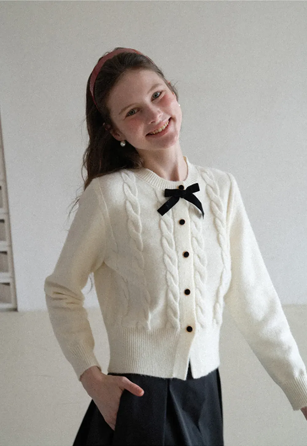 Elegant Cable Knit Cardigan with Bow Detail
