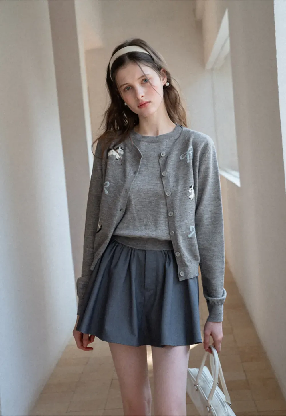 Woolen knit sweater with horse and bow motifs