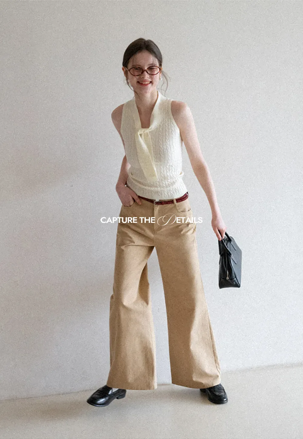 Knit Sleeveless Top with Front Bow Detail