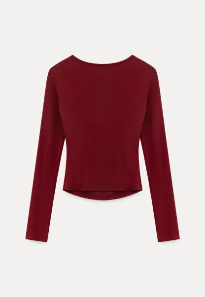 Long sleeve top with front cutout detail