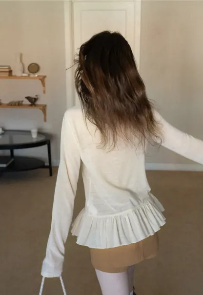 floral dot long sleeve top with ruffle hem