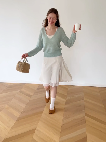 Ladies V‑Neck Knitted Pullover and White Cami Set